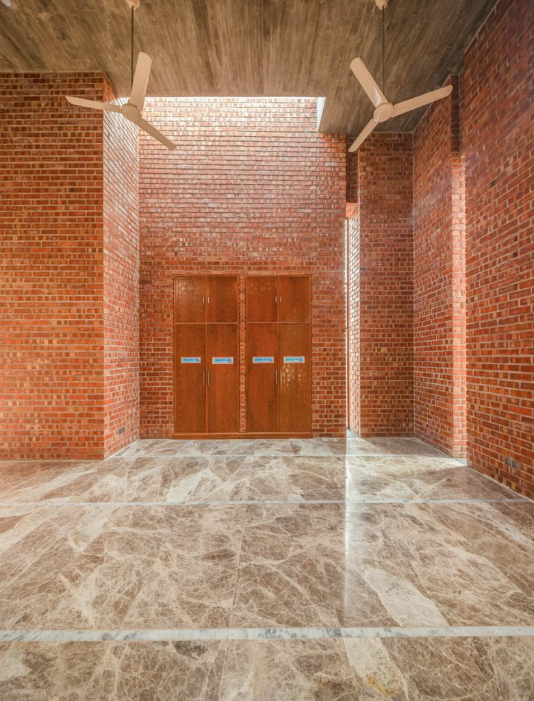 "Warm brick textures illuminated by soft natural light"

